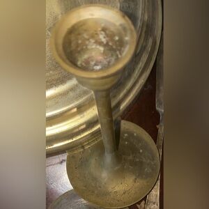 vintage brass candle holder, likely dating back to the late 19th or early 20th